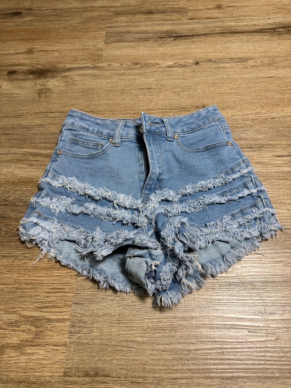 High-Rise Frayed Light Blue Denim Shorts